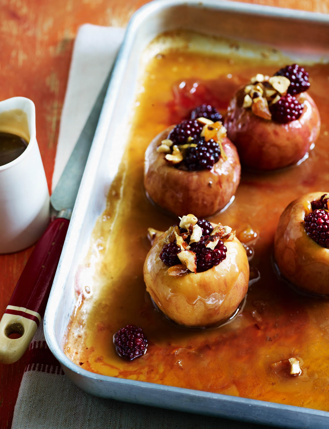 Baked toffee apples with blackberries Sainsbury`s Magazine